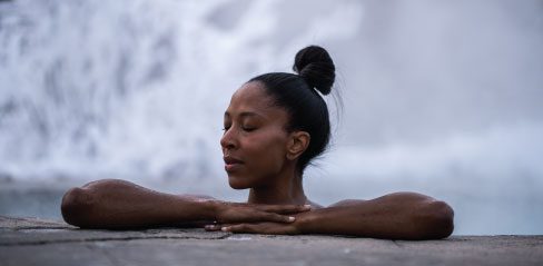 Woman enjoying the Baths in winter at Scandinave Spa Blue Mountain